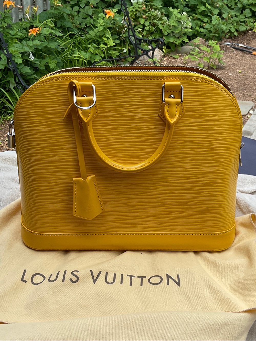 Louis Vuitton Epi Alma PM Satchel in Yellow